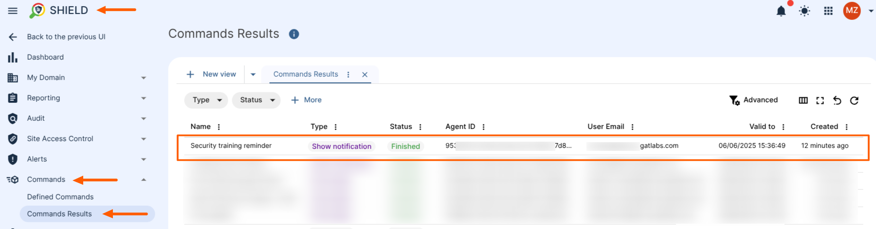 GAT Shield Commands Results screen showing a completed 'Show notification' command titled 'Security training reminder' with status marked as Finished, including agent ID, user email, and timestamp